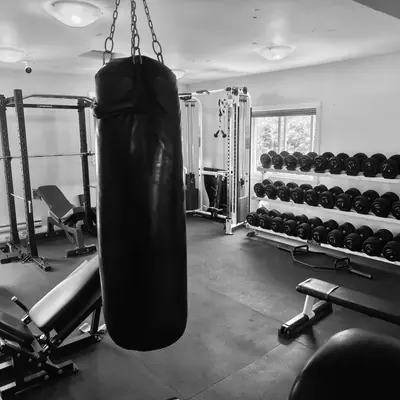 Heavy bag and dumbbell rack